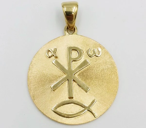religious medal in 18k yellow gold