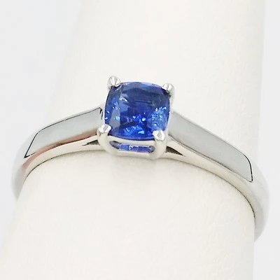 small size ring with blue sapphire in solid silver