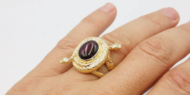 men's snake ring with red garnet