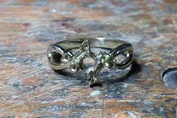 ring in non-rhodium-plated white gold