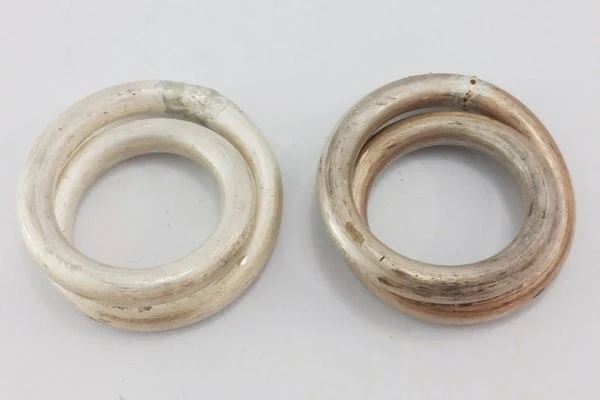 two double silver rings