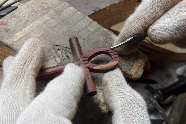 engraving of the handle of the cross of life pendant