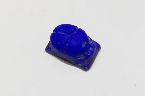 Egyptian scarab in lapis lazuli before mounting on the pendant