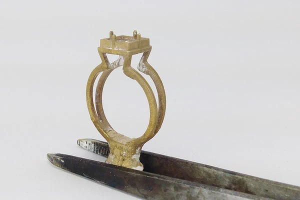 ring with topaz in raw gold