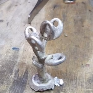 casting tree from which the coffee bean mesh is cut
