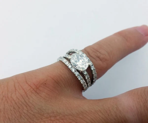 large diamond ring on the finger
