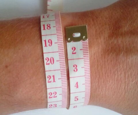 measure the circumference of your wrist with a tape measure